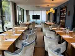 Terrace Restaurant at Gonville Hotel: modern meeting space with natural light and AV equipment.
