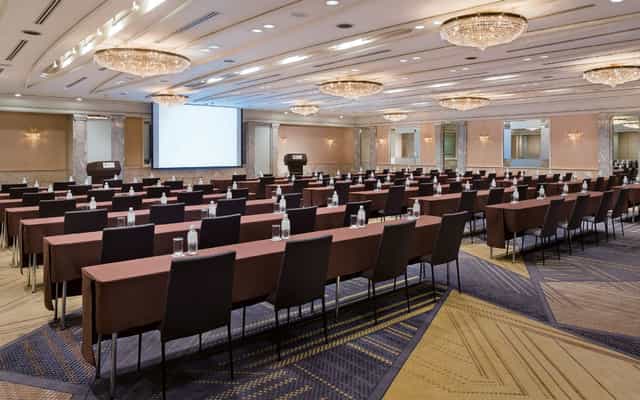Classroom-style Crystal Room at Hyatt Regency Tokyo for corporate conferences and plenary sessions.