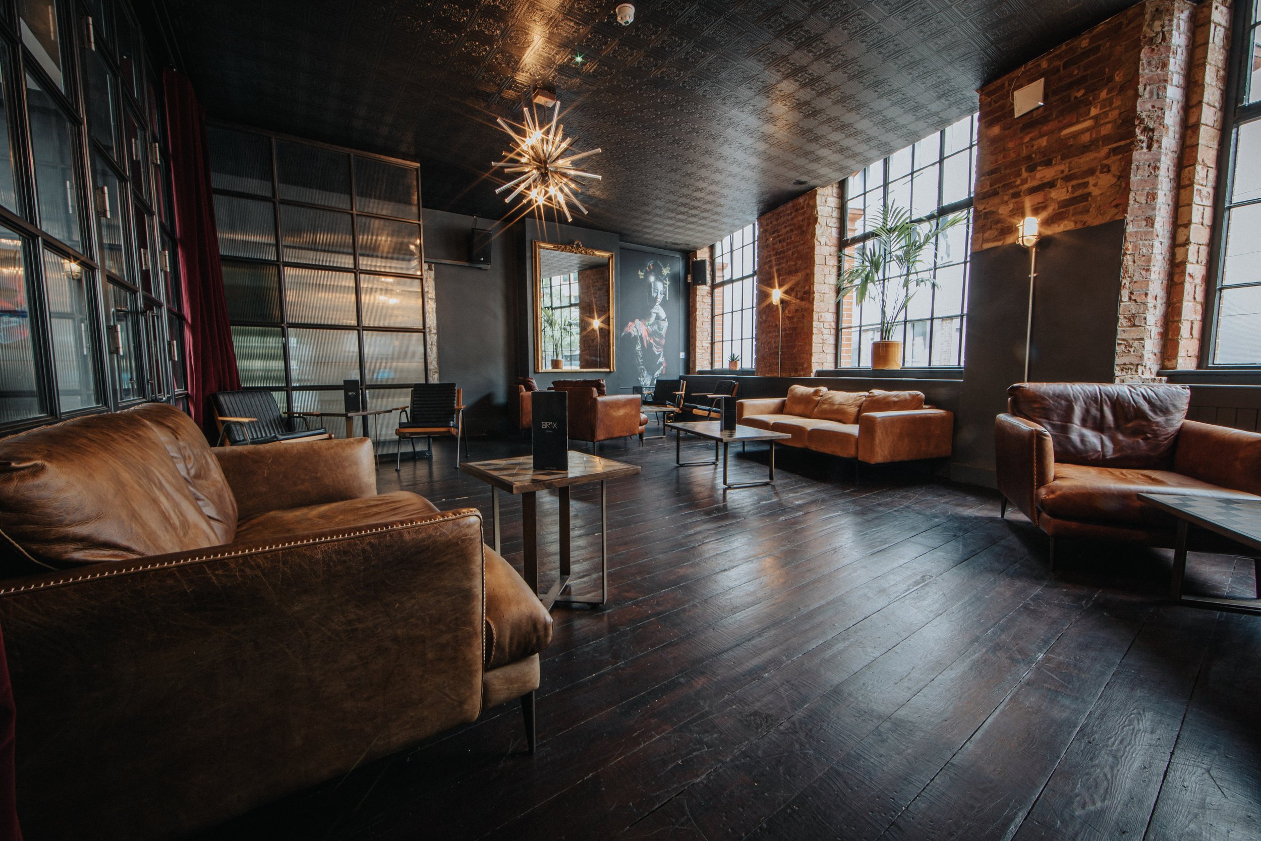 Industrial-chic BRIX LDN dining room for VIP hospitality and networking events.