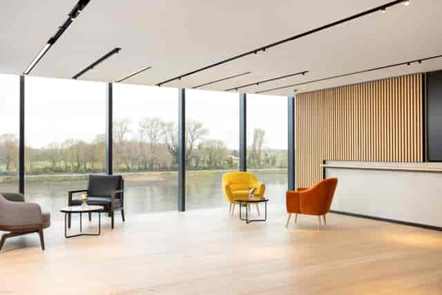 Modern meeting space at Fulham Pier with waterfront views, ideal for workshops and networking.