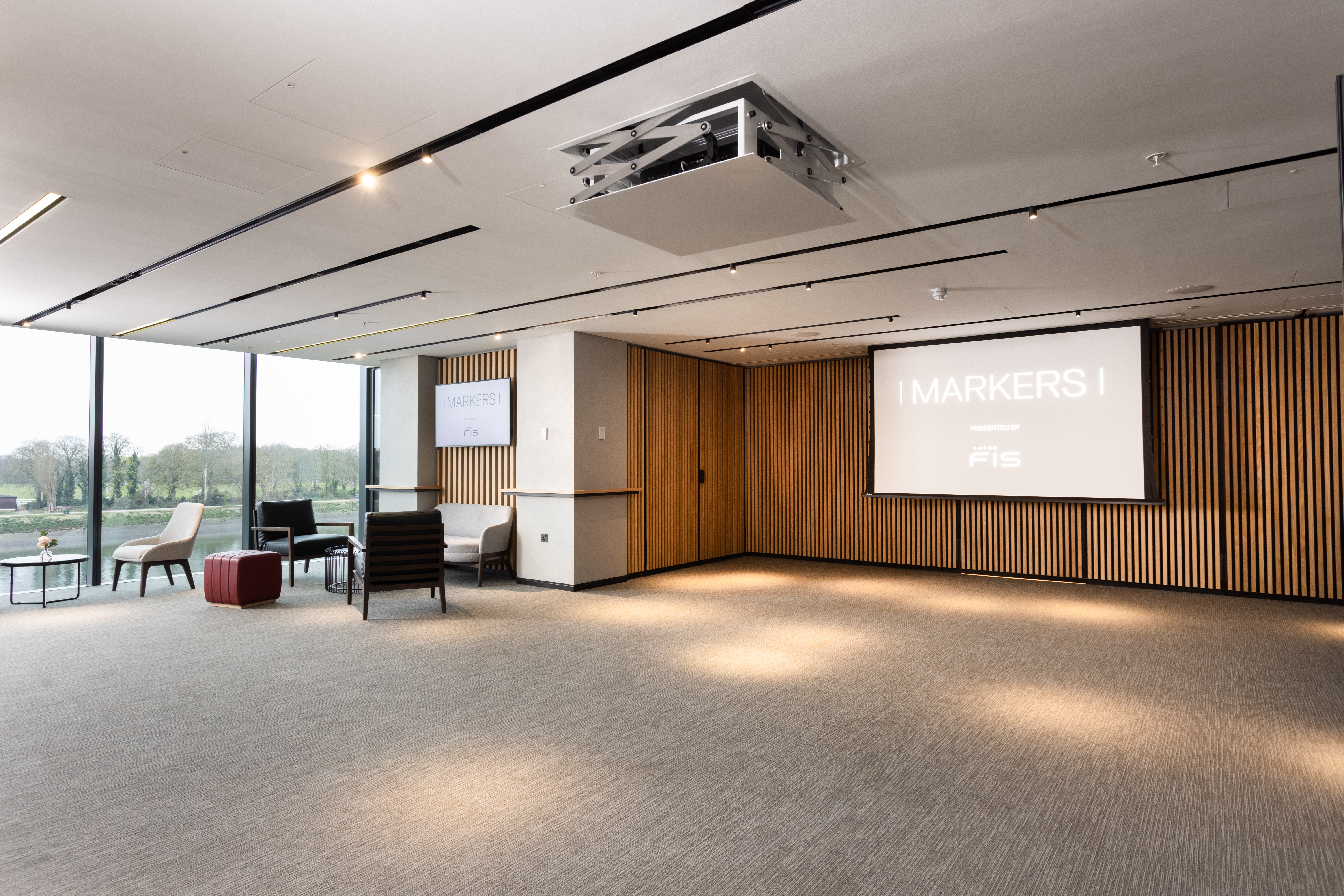 Modern meeting space in Fulham Pier, perfect for events and presentations with natural light.