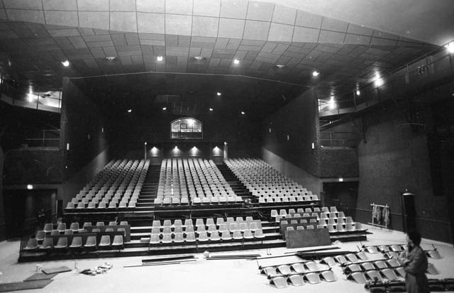 Transbordeur concert hall with tiered theater seating for plenary sessions and corporate events.