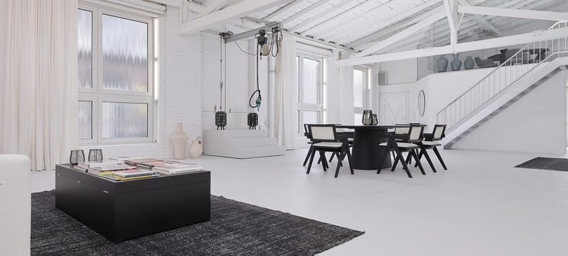 Minimalist loft event space in Düsseldorf for VIP dinners and creative workshops.