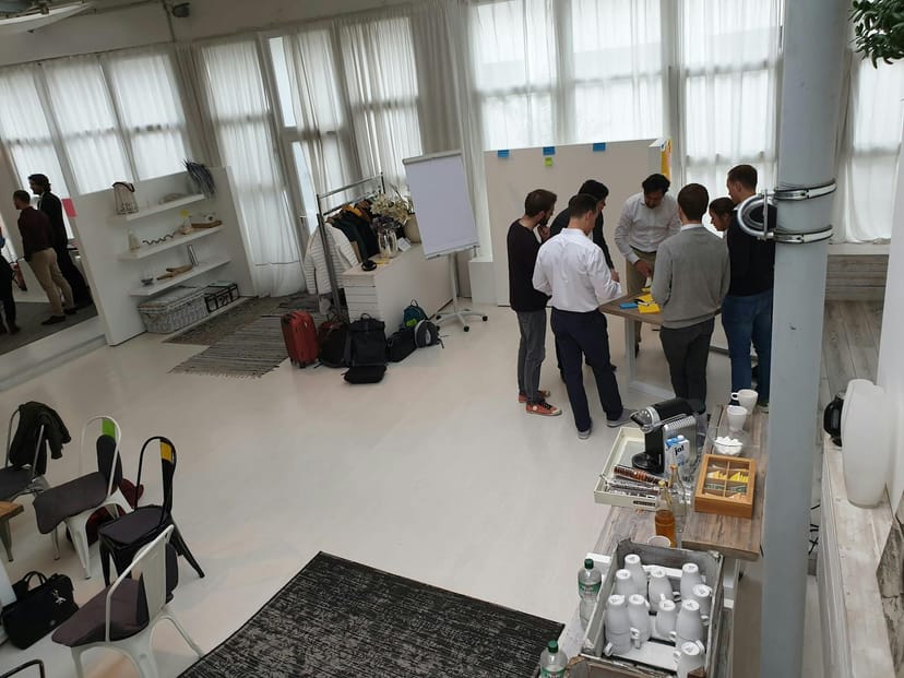 WhiteLoft Düsseldorf workshop space with organized storage for corporate events and team meetings.
