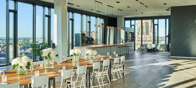 Amsterdam Lounge rooftop venue with floor-to-ceiling views for boardroom dinners and receptions.