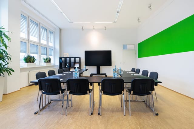 U-shaped boardroom in RWI4 for corporate meetings and interactive planning sessions.