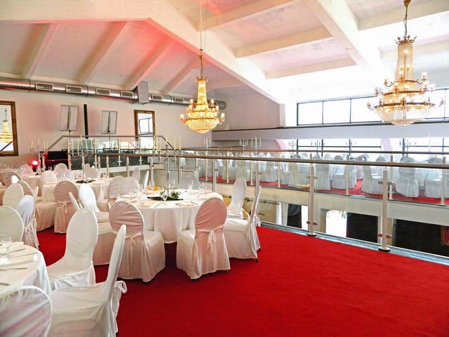 Festsaal event space with crystal chandeliers for elegant weddings and formal galas.