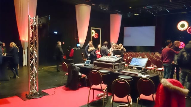 Theater der Träume Festsaal with AV production setup and stage lighting for corporate event venue.