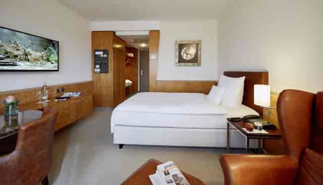 Modern hotel room in Lindner Hotel Dusseldorf Airport for business travel and corporate events.