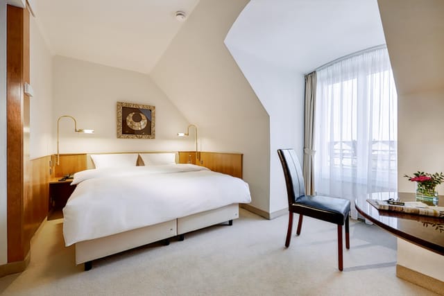 Minimalist conference room at Lindner Hotel Dusseldorf Airport, ideal for business meetings.