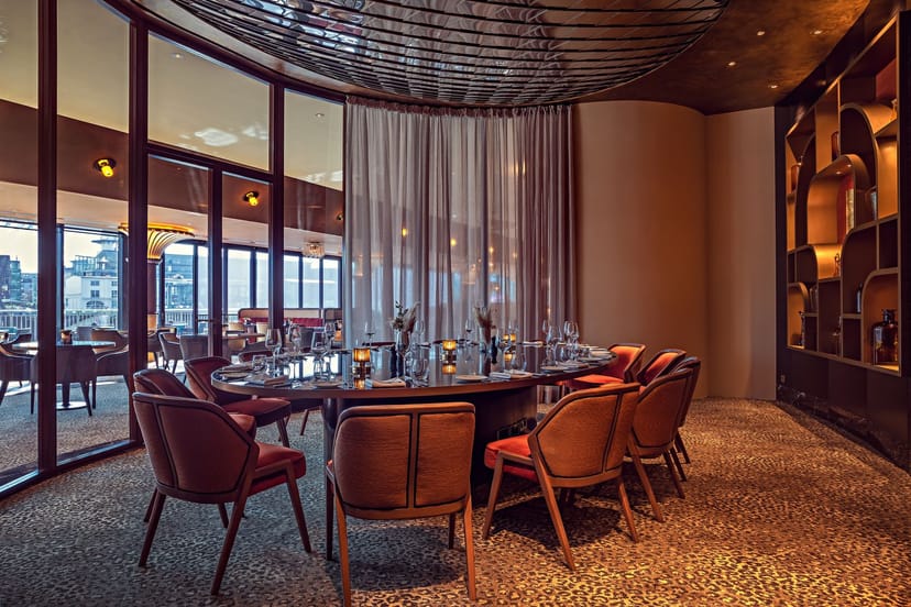 Private dining room at DOX Restaurant: elegant boardroom setting for executive events.