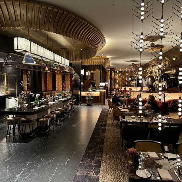 Upscale lounge with bar seating for VIP welcome receptions and executive networking events.