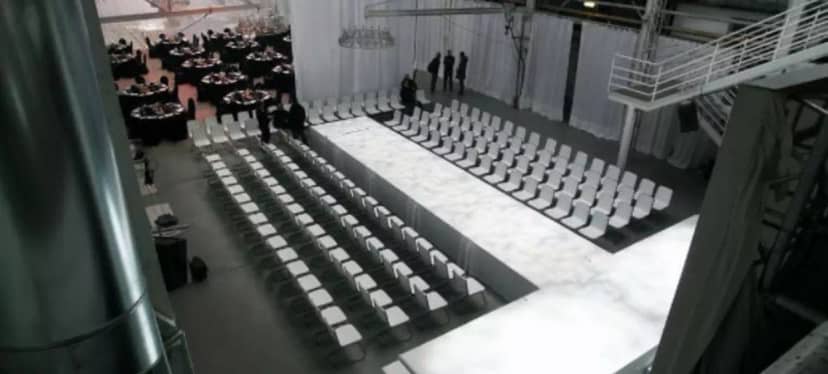 Minimalist fashion runway and banquet event setup at Companion Deck, Lofthaus Studios Düsseldorf.
