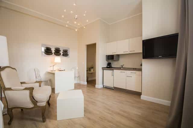 Classic Suite with kitchenette for business travel or VIP event accommodation.