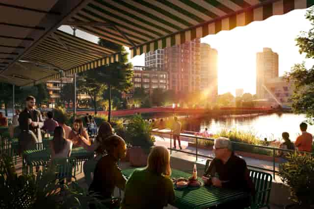 Waterfront terrace at golden hour for corporate networking event and casual mixer.