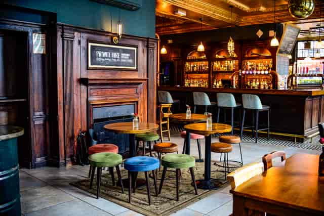 Bar in The Ram with warm vintage decor, ideal for private hire and networking events.