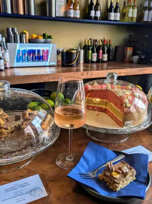 "Elegant networking venue with dessert display and rosé at Sanctum 1782 event."