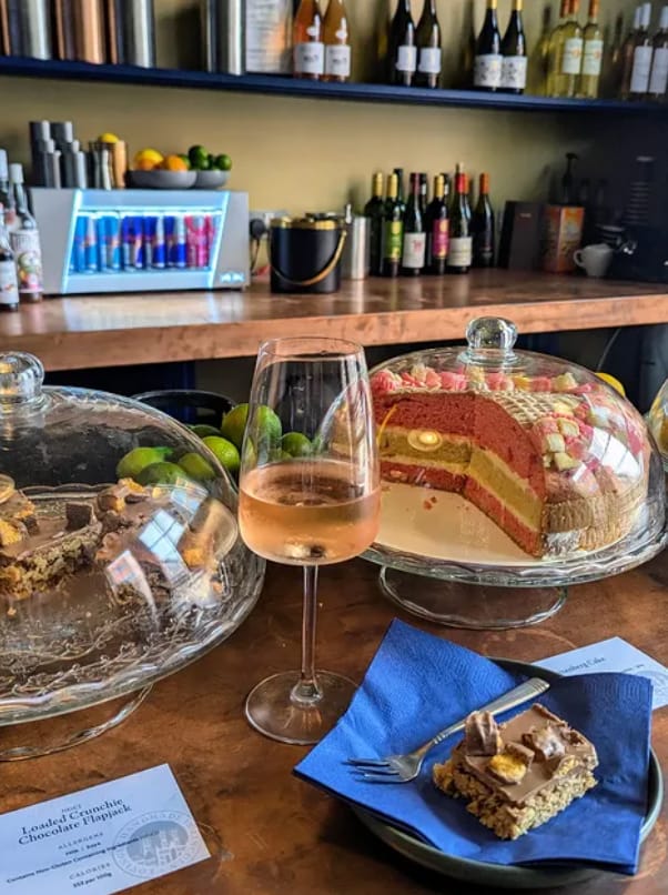 "Elegant networking venue with dessert display and rosé at Sanctum 1782 event."