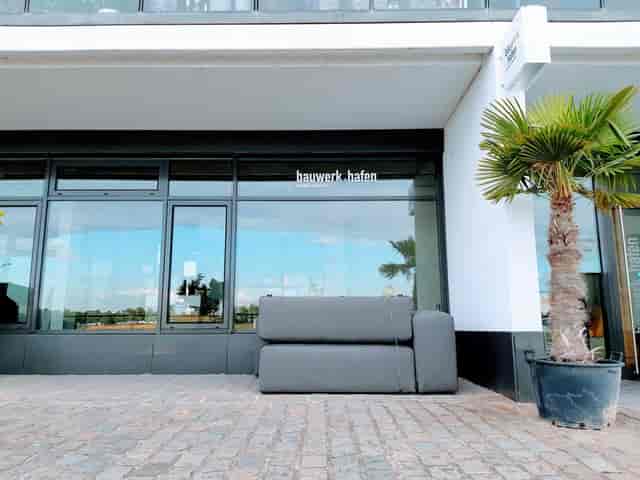 Modern industrial outdoor lounge for event networking and registration at Invora Haven.