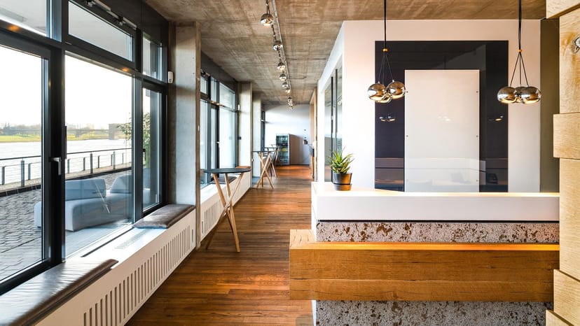 Modern industrial foyer at Invora Haven, perfect for upscale event registration and networking.