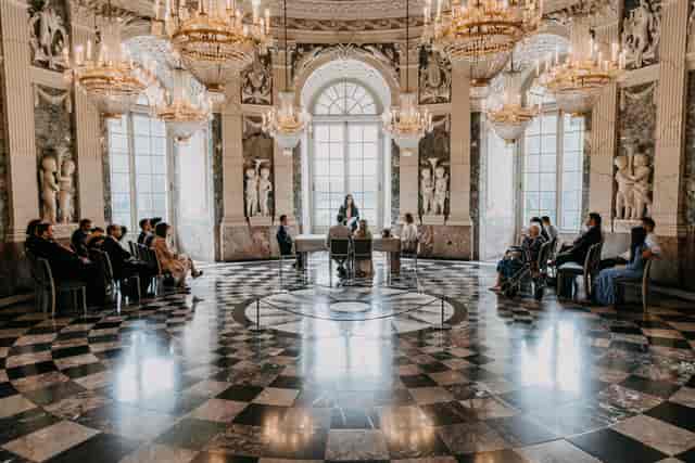 Schloss Benrath ceremonial hall with marble floors for luxury micro-events and corporate galas.