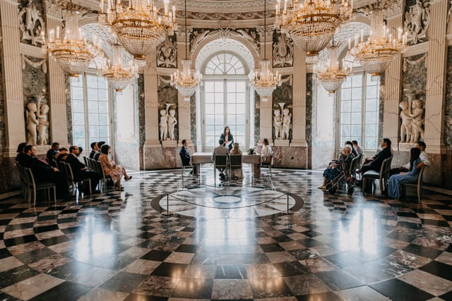 Schloss Benrath ceremonial hall with marble floors for luxury micro-events and corporate galas.