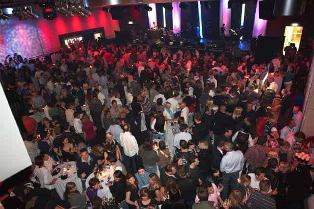 Henkel-Saal reception with atmospheric lighting for corporate networking and business events.