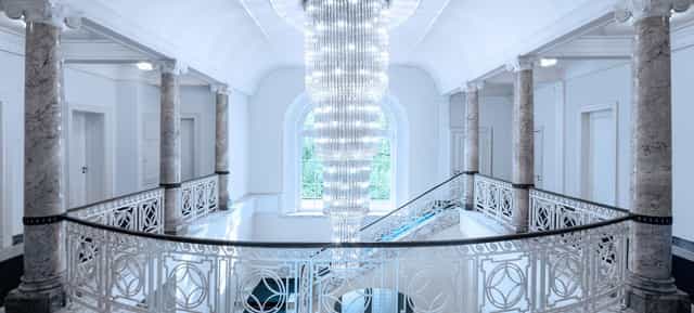 Elegant gala entrance stage at Villa Boisserée, premium event registration area.