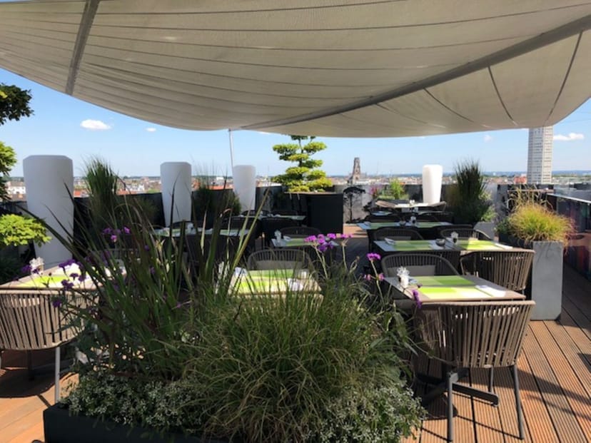 Savoy Hotel Köln rooftop terrace: stylish cocktail reception venue with city skyline views.