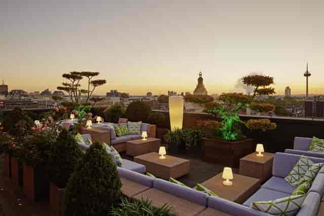 Savoy Hotel Köln rooftop terrace with lounge seating for corporate cocktail and VIP networking.