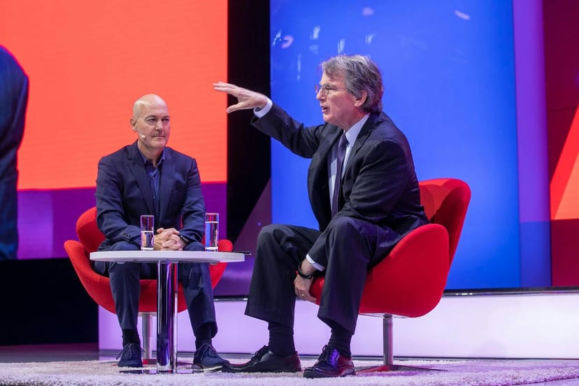 Two speakers in a fireside chat at the DMEXCO Innovation Stage with professional LED backdrop.