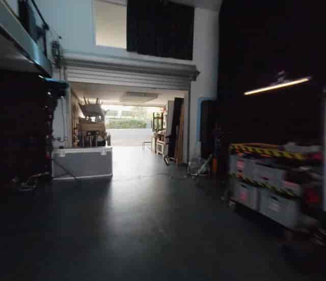 Behind-the-scenes view of Westside Studios event space, showcasing logistics and technical setups.