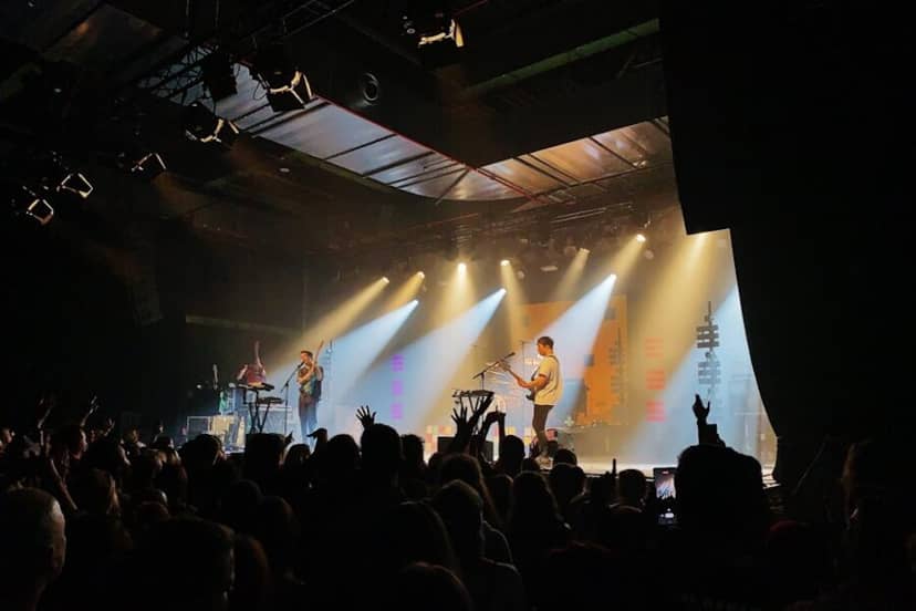 Live band at Carlswerk Victoria concert, atmospheric stage lighting, sold-out music event.