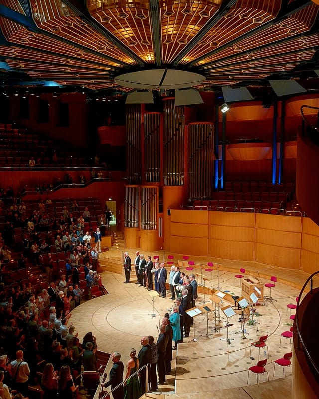 Kölner Philharmonie tiered concert hall for high-profile keynote and awards ceremony.