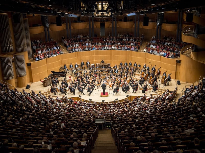 Kölner Philharmonie tiered seating venue for corporate plenary and theatrical performance events.