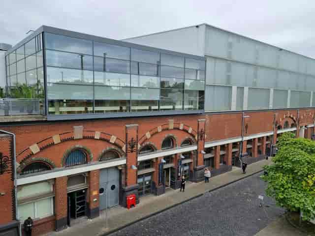 Event Loft industrial venue with historic brick and glass for trade shows and product launches.