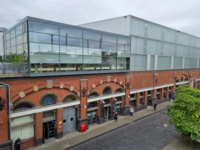 Event Loft industrial venue with historic brick and glass for trade shows and product launches.