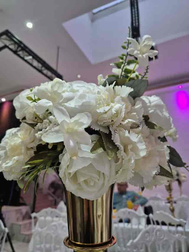 Silk floral centerpiece at Sato Deluxe Ballroom for elegant, budget-friendly wedding event decor.
