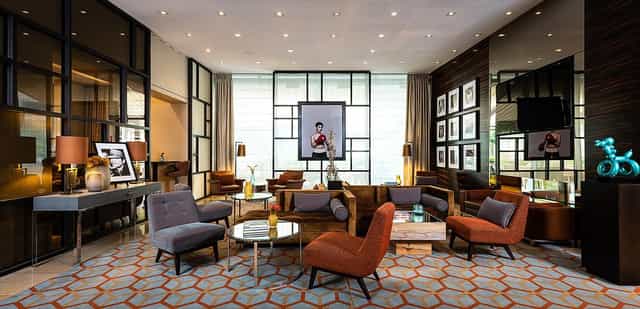 Modern VIP lounge at Hotel St. Josef Cologne: modular furniture for networking and business events.