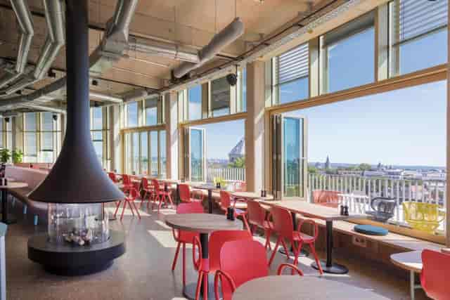 Satellites breakout space at 25hours Hotel with industrial design for workshops and networking.