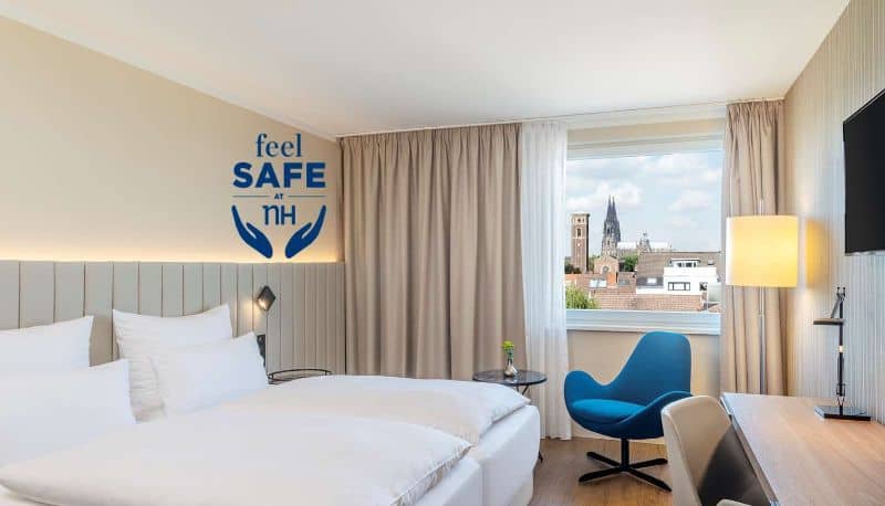 Modern hotel room in Cologne Altstadt for corporate business events and conference accommodation.