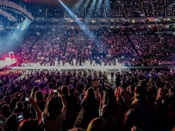 LANXESS arena concert hall with vibrant stage lighting for large-scale live music event production.