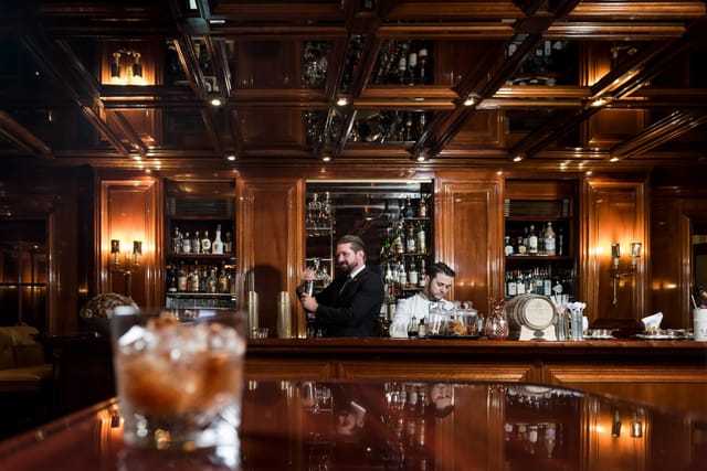 Classic hotel bar at Excelsior Hotel Ernst, ideal for VIP networking and conference receptions.