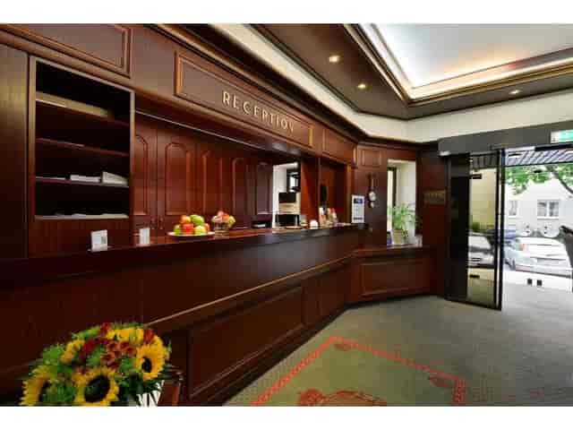 Pius 2 Hotel Imperial reception desk for event registration and group check-ins.
