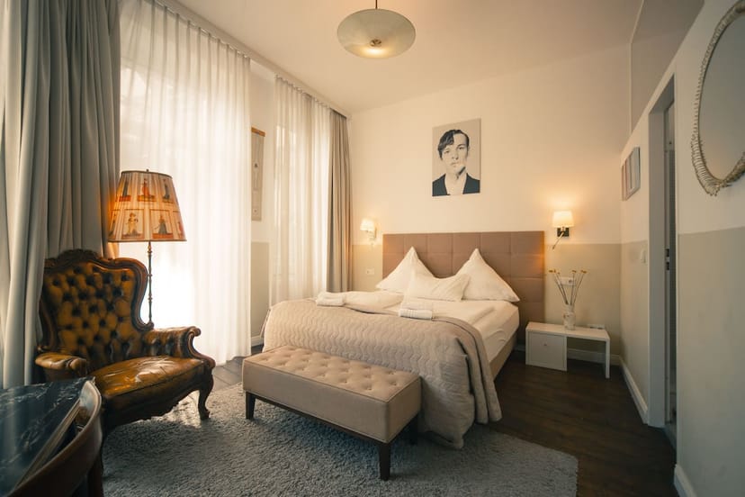 Luxury Maison Marsil boutique hotel suite for VIP conference event or speaker accommodation.