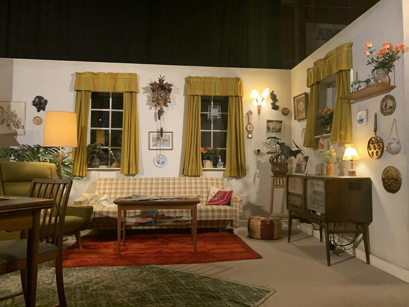 Mid-century modern reception lounge for themed corporate events and immersive brand activations.