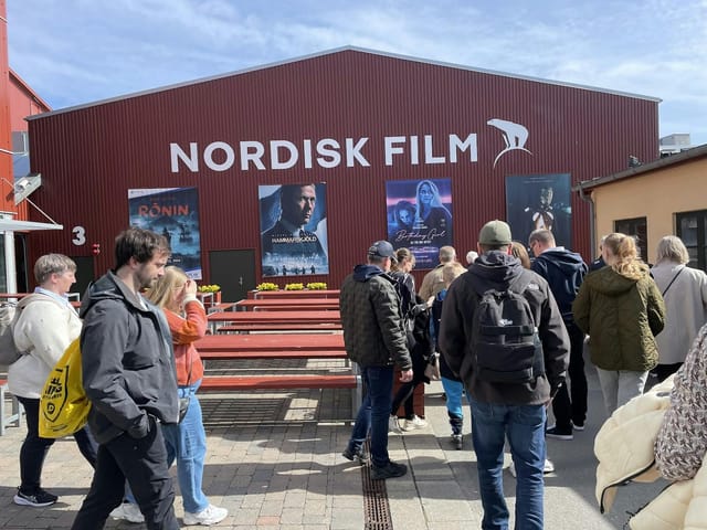 Nordisk Film outdoor reception space with bench seating for corporate networking and brand events.