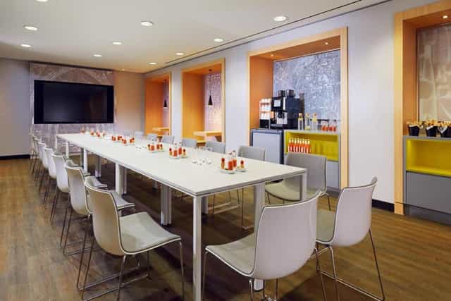 Boardroom at Cologne Marriott Hotel with AV setup for corporate meetings and business events.