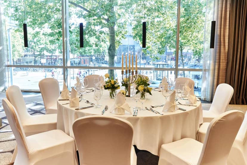 Elegant banquet setup at Steigenberger Hotel Köln for corporate lunch or event celebration.