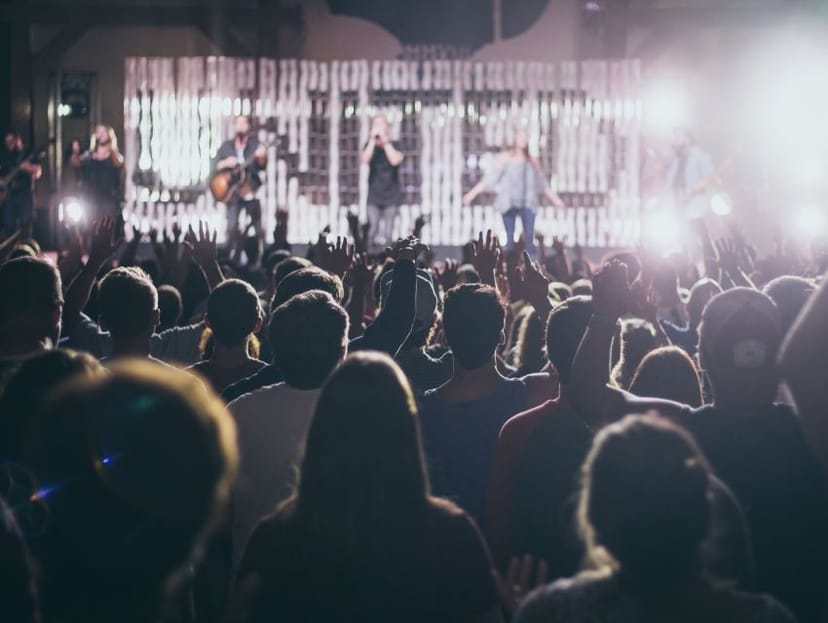 Sold-out concert at MTC Live Music Club with dynamic stage lighting for a live music event.
